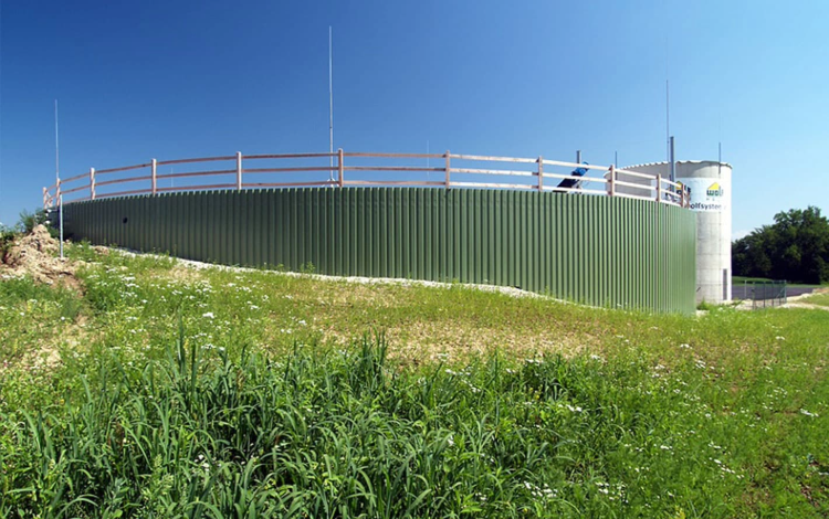 BIOGEST biogas plant in Austria integrated into the natural landscape with green cladding